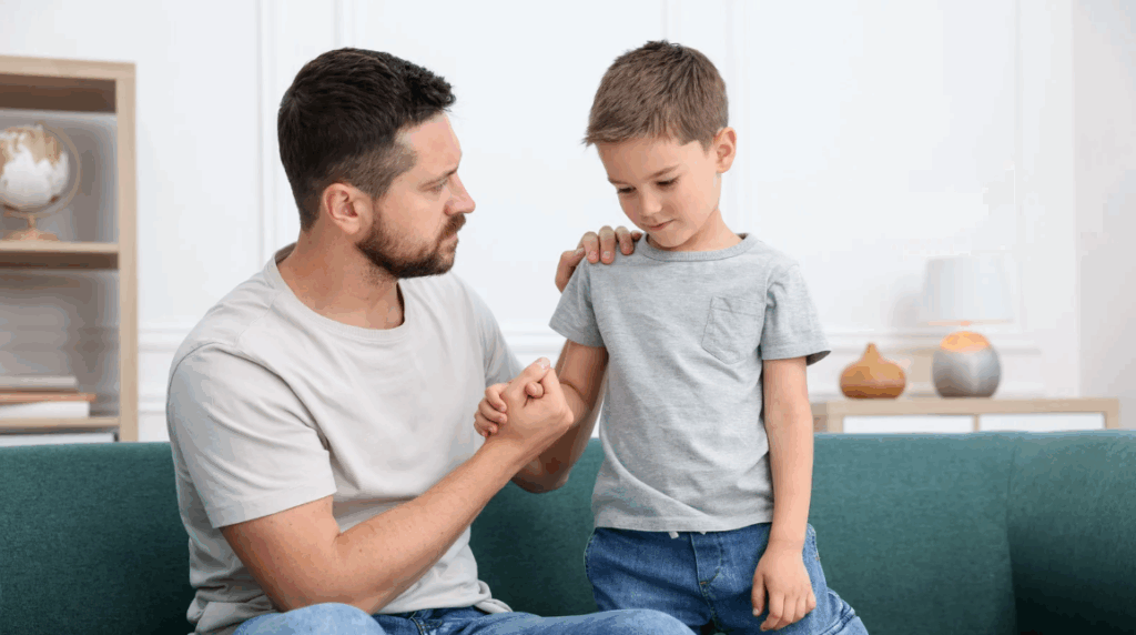 a father showing concern to his preschool age child