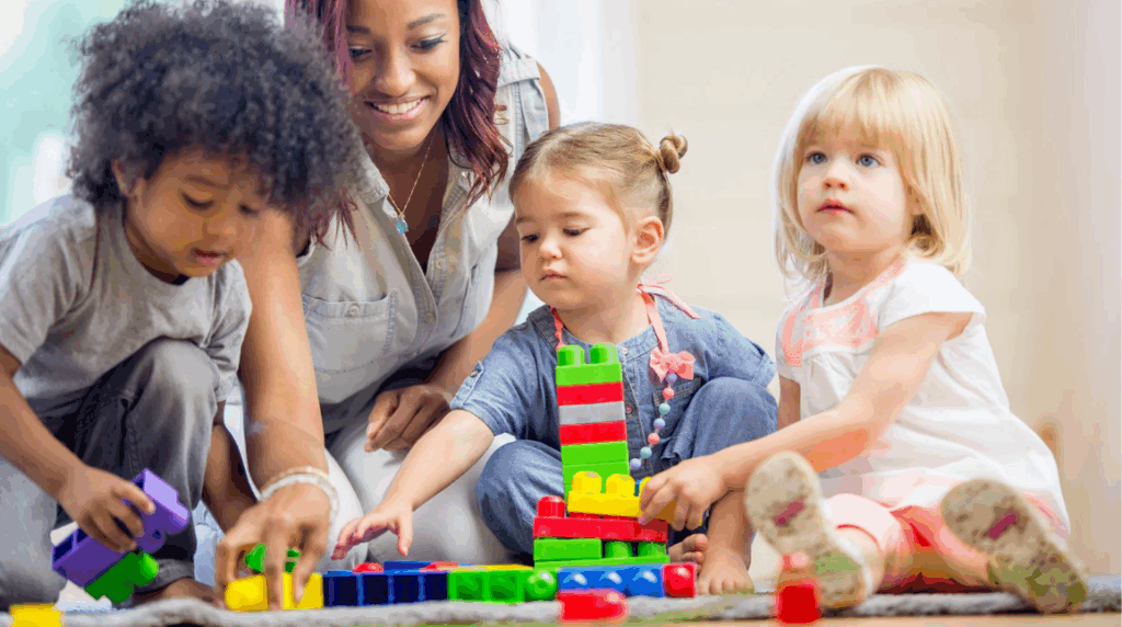little children enjoy playing colorful blocks