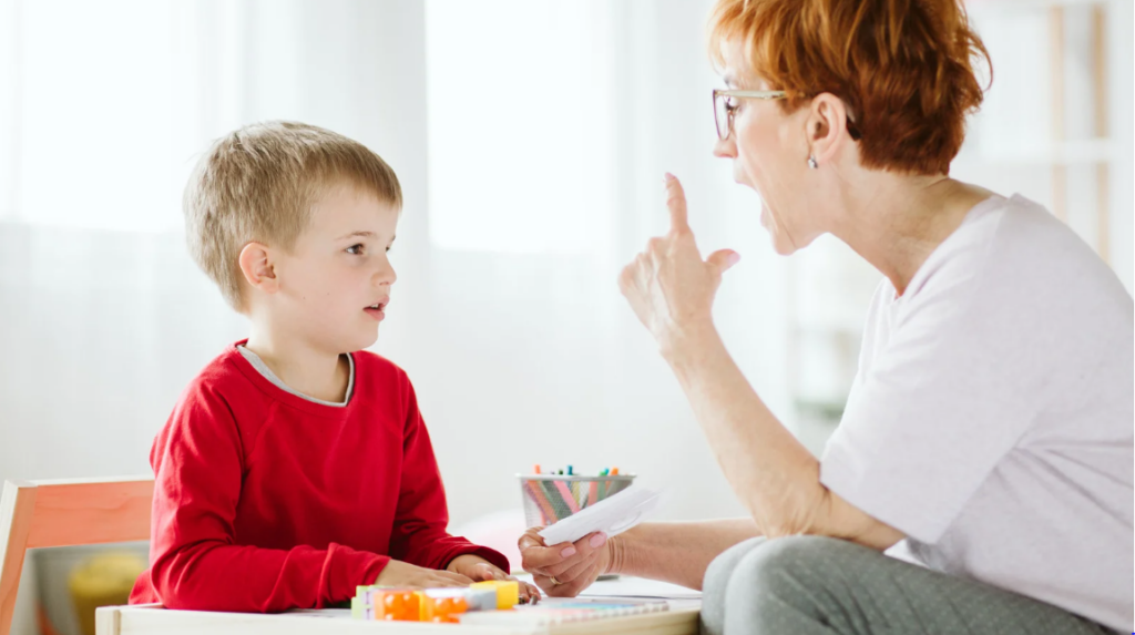 mom teaching his son new words